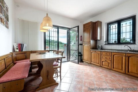 Kitchen apartment Loggione with Dining Area