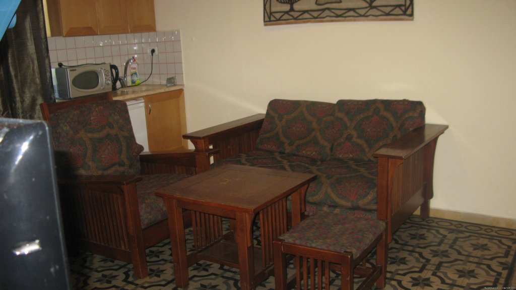 Sitting area of the family suite. | Beautiful Old Jerusalem Vacation Home | Image #4/7 | 