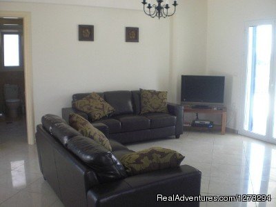 Lounge/ T.V Area | Luxury Villa set in quiet village | Image #2/7 | 