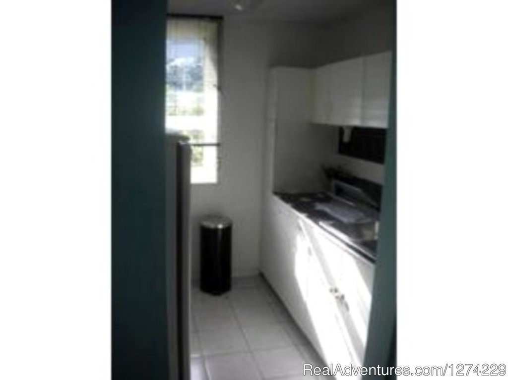 Kitchenette | Ocho Rios beachfront resort condo | Image #5/6 | 