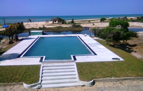 Pool and sea view from upper deck Cofee shop.