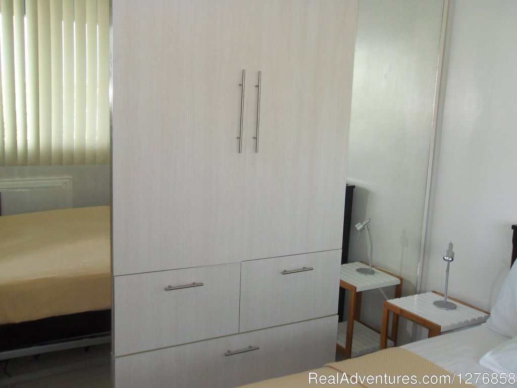 Closet with body mirrors | Sea Residences Condominium next to SM Mall of Asia | Image #7/19 | 