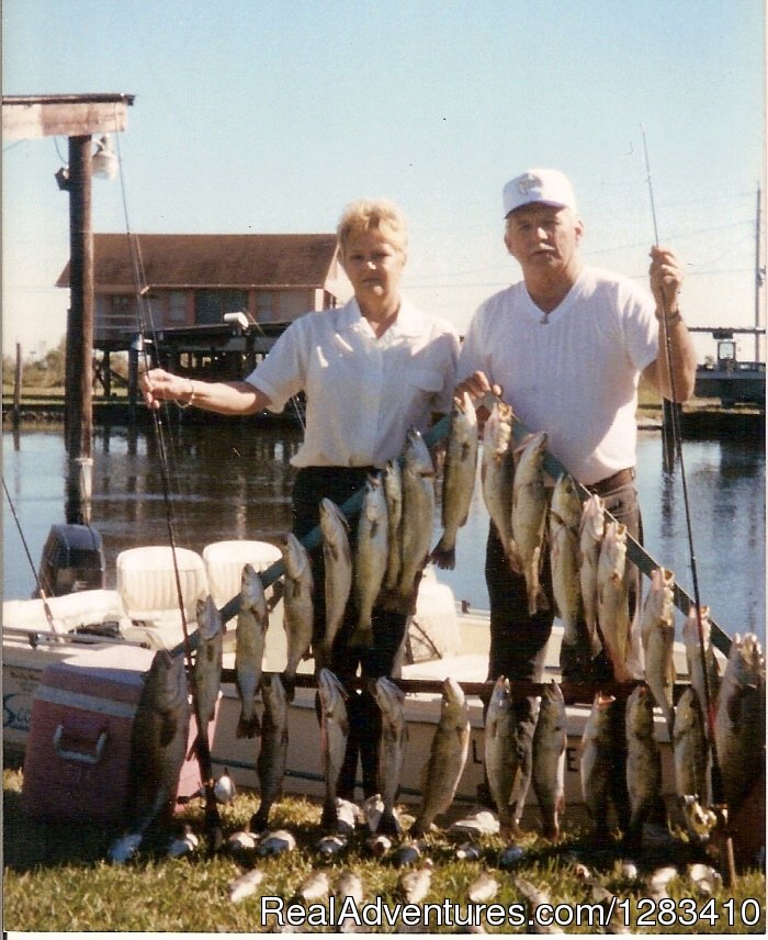 A Great Day On The Water For This Man And His Wife. | Bayou Log Cabins | Port Sulphur, Louisiana  | Fishing Trips | Image #1/13 | 