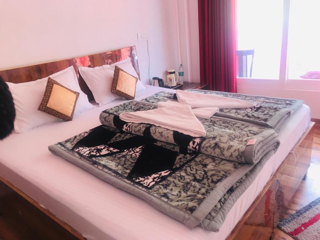 Bedroom | Rigveda-luxury Resort For Chardham Yamunotri | Image #5/5 | 